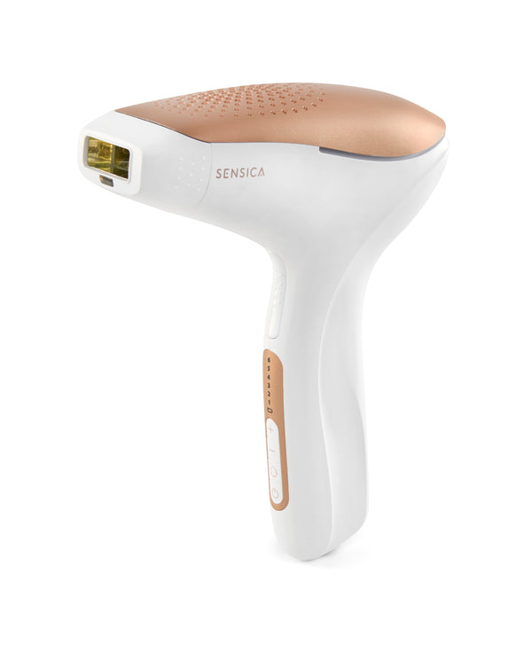 White and rose gold Sensica hair removal device on a white background